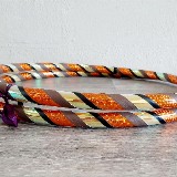 Foto 1 - Travel Hoop | Peacock Orange/Gold/Brown/Black 